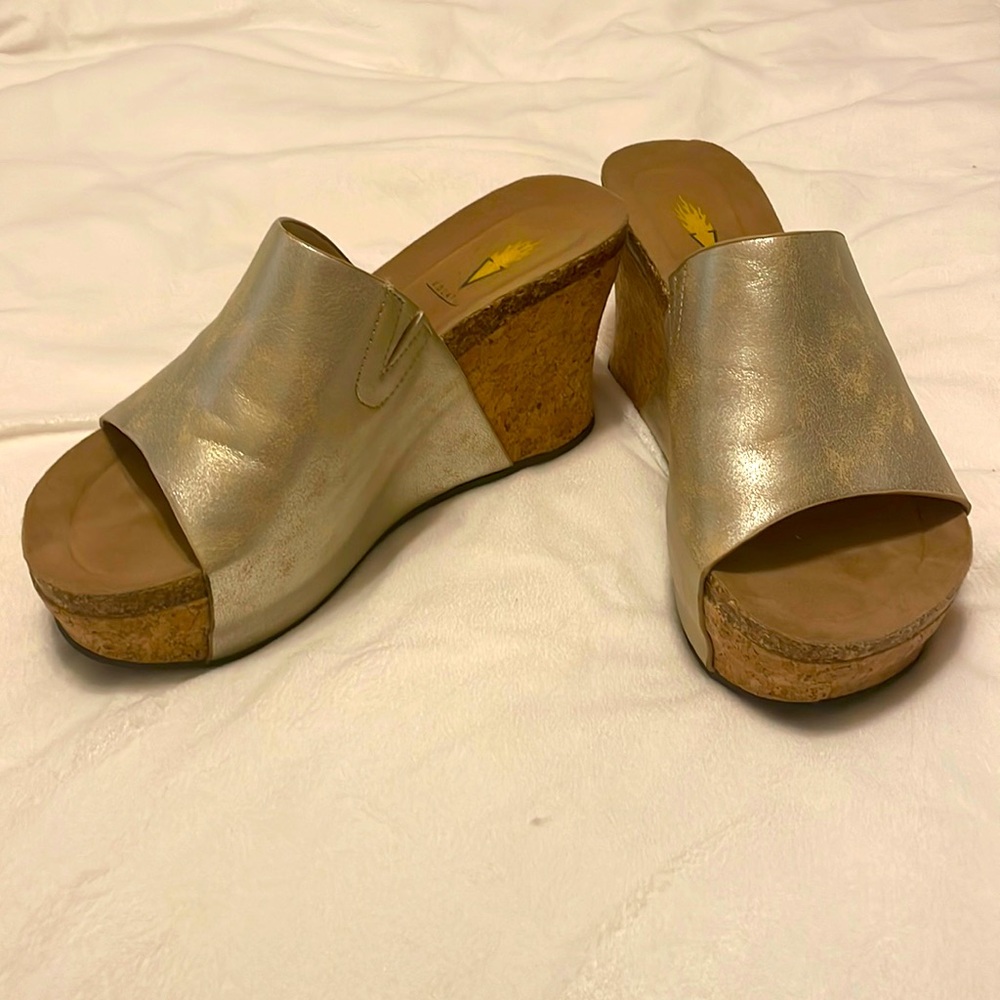 Volatile gold/silver platform wedges. 3 1/2 inches tall. Excellent condition!